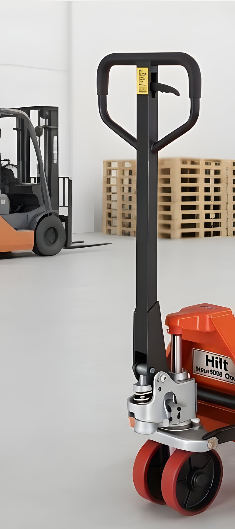 Orange Hilt DF30 hand pallet truck showing the tiller, hydraulic pump, and polyurethane steering wheels