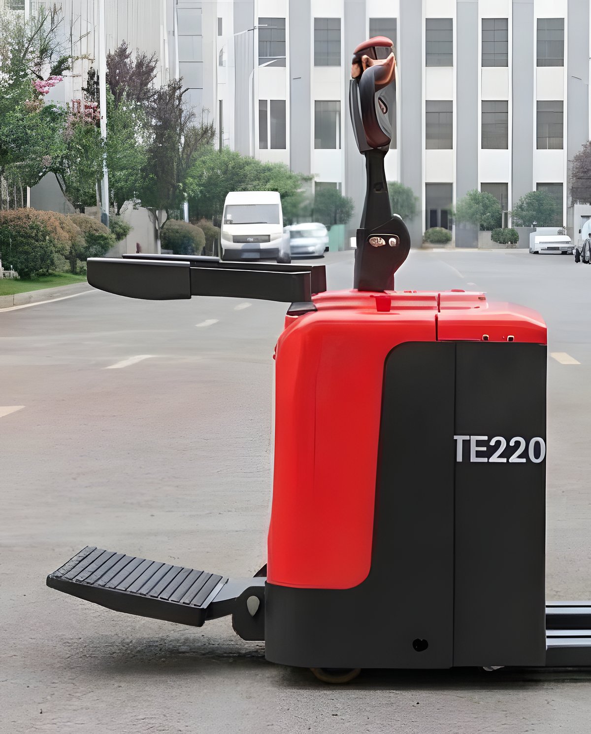 Red Hilt TE220 electric pallet truck with folding operator platform and black forks